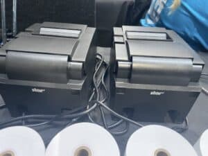 Two Star receipt printers with paper rolls