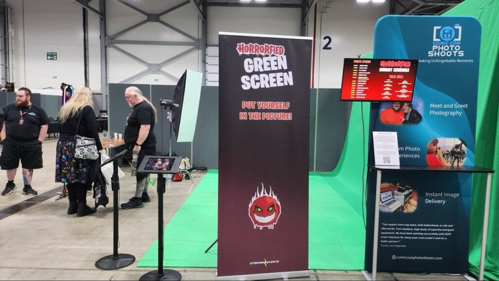Green screen photo booth at a comic convention