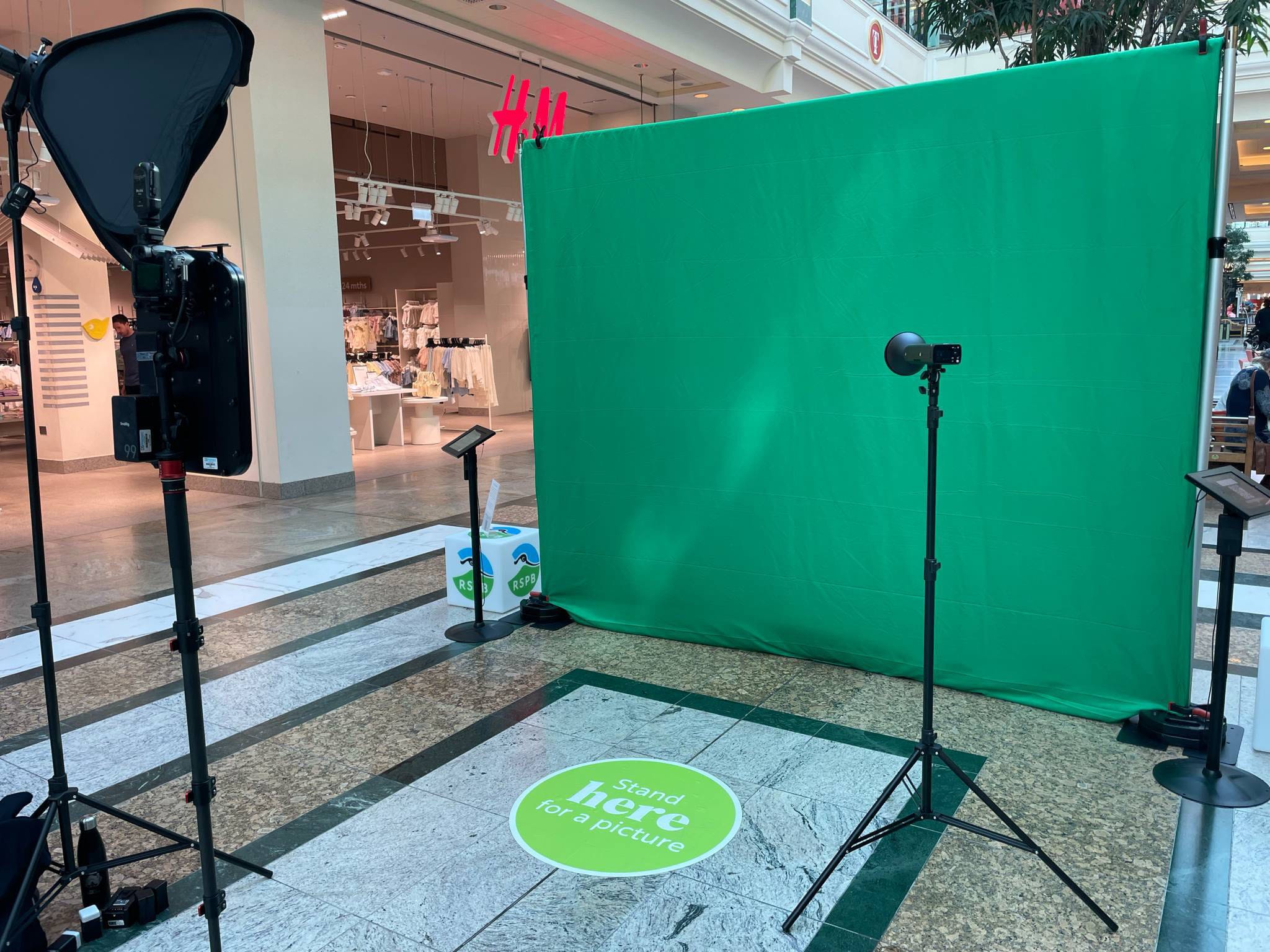 Photo booth with green screen in shopping centre.